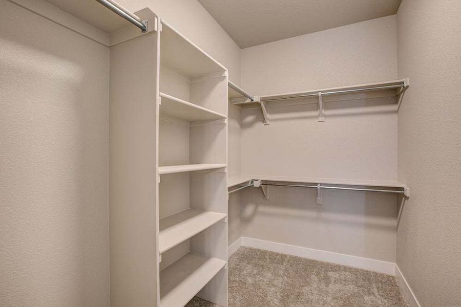 Primary Closet - Not Actual Home - Finishes May Vary