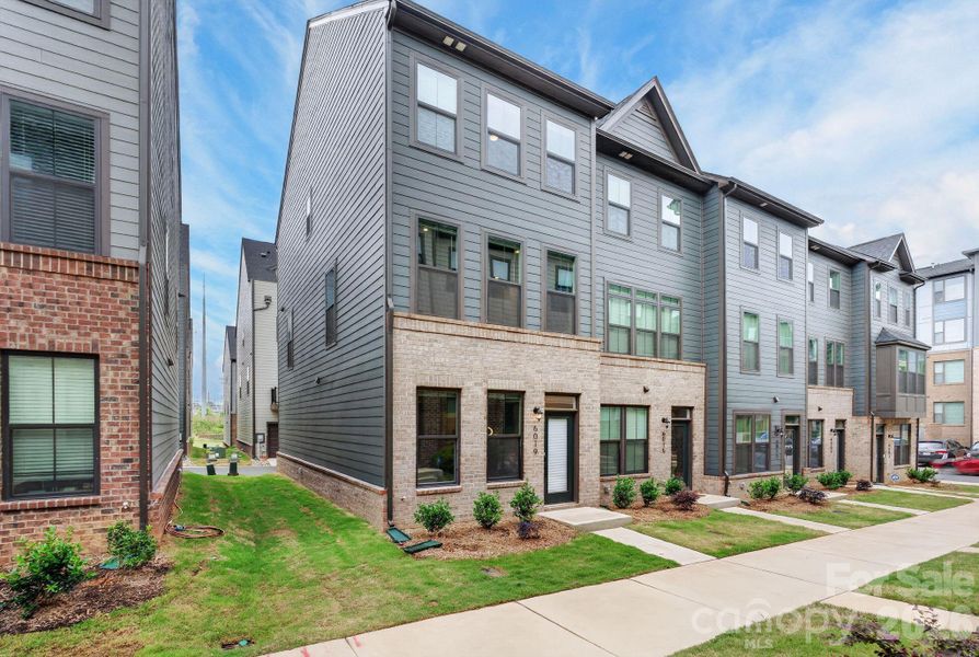 Built in 2025, this end-unit townhouse offers modern style in the Southrail Station community