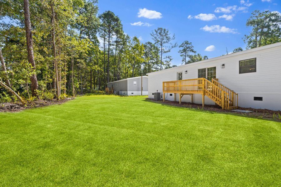 Exterior details and patio area of a home in , Ravenel (Image 29). Exterior details and patio area of a home in , Ravenel (Image 29).