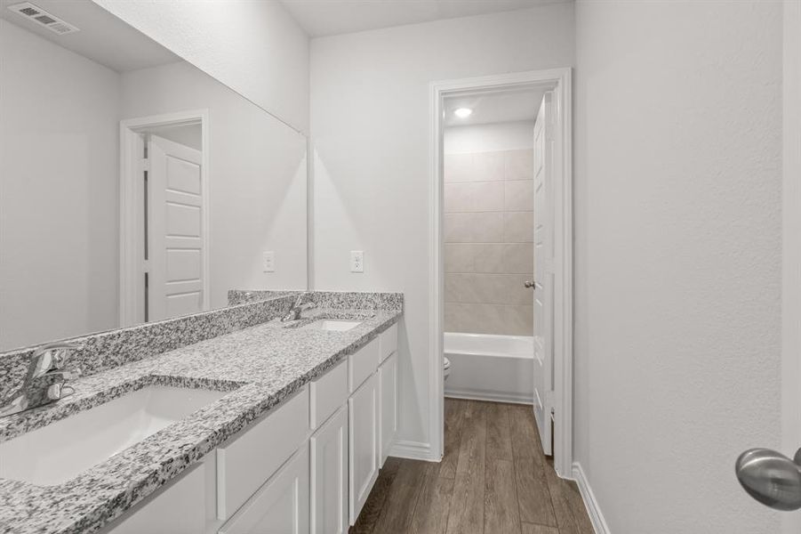 Furnished interior view inside a new home in Retreat at Fossil Creek, Fort Worth (Image 5). Furnished interior view inside a new home in Retreat at Fossil Creek, Fort Worth (Image 5).