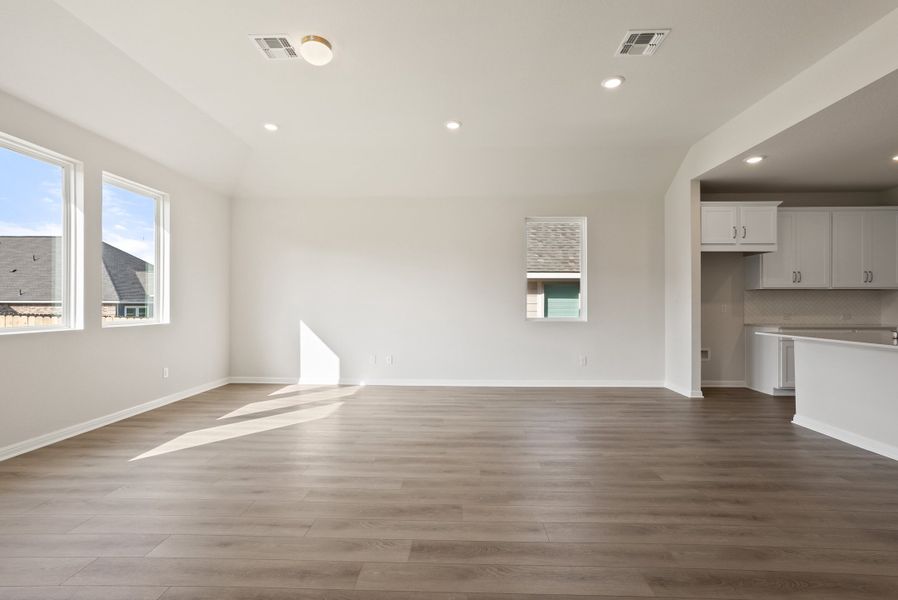 Representative unfurnished interior of a home built from the Somerville by Ashton Woods in Willow Springs, Buda (Image 34).