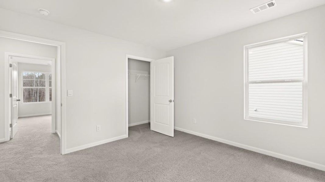 Spacious, unfurnished interior of a new home in Parkside at Carter Grove, Cartersville (Image 22).