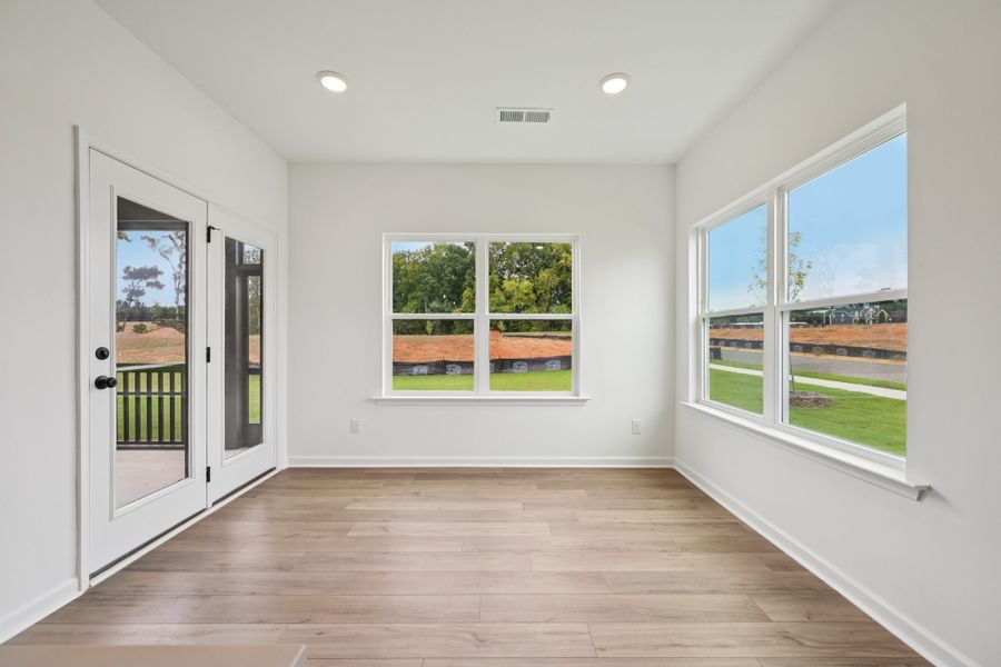 Representative unfurnished interior of a home built from the Macon by Ashton Woods in Rowland's Grant, Fuquay Varina (Image 44).