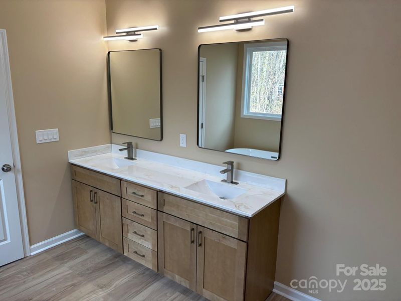 And a dual vanity w/individual mirrors and lighting. And a dual vanity w/individual mirrors and lighting.