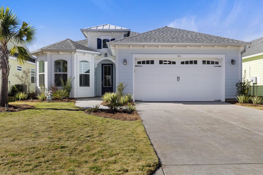 Front exterior of a new home in , Hardeeville, SC, highlighting curb appeal (Image 1).