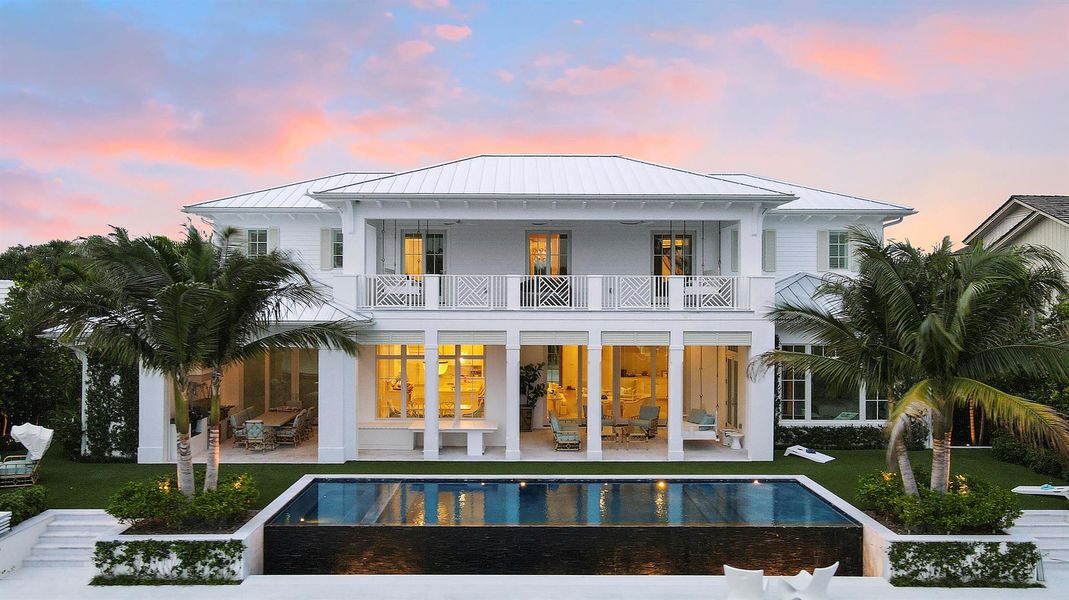 Front exterior of a new home in , North Palm Beach, FL, highlighting curb appeal (Image 2). Front exterior of a new home in , North Palm Beach, FL, highlighting curb appeal (Image 2).