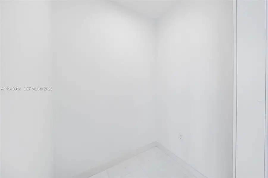 Spacious, unfurnished interior of a new home in Aston Martin Residences, Miami (Image 22).