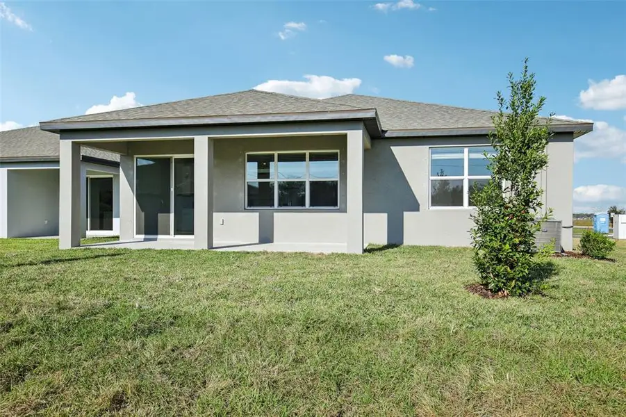 Exterior details and patio area of a home in Coasterra - Reserve Series, Palmetto (Image 4).