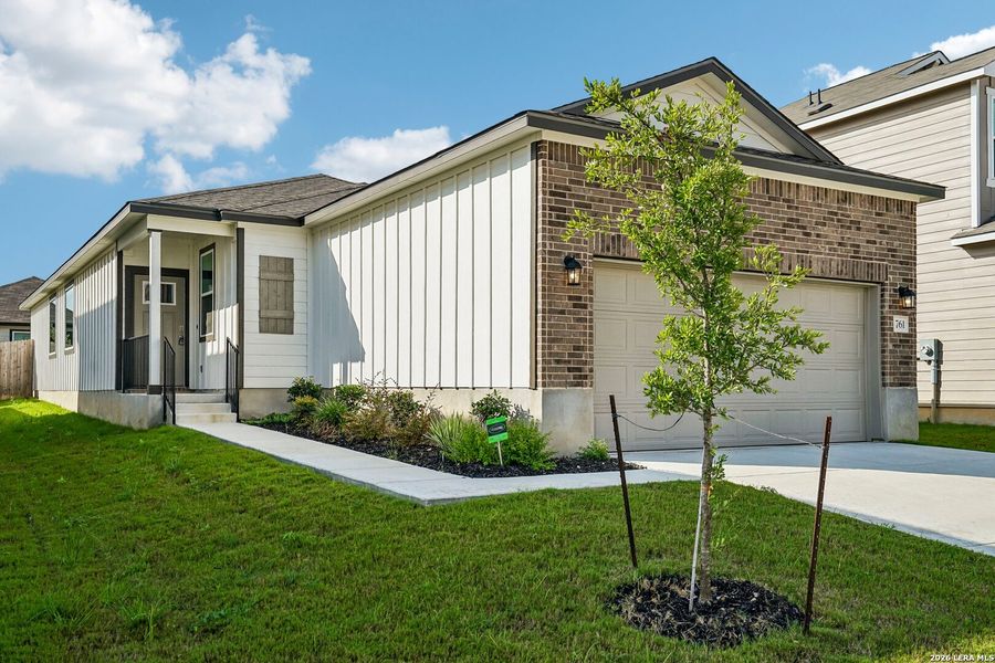 Front exterior of a new home in , New Braunfels, TX, highlighting curb appeal (Image 21). Front exterior of a new home in , New Braunfels, TX, highlighting curb appeal (Image 21).