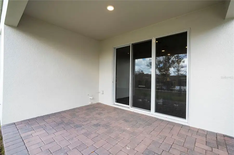 Exterior details and patio area of a home in , Apopka (Image 3).