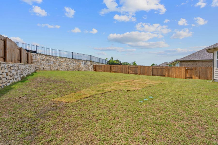 View of yard with a fenced backyard View of yard with a fenced backyard