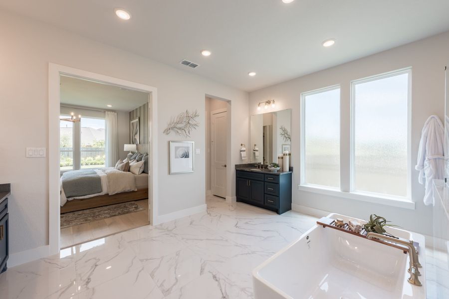 Representative furnished interior of a home built from the Woodbridge by Tri Pointe Homes in Bridgeland, Cypress (Image 30).