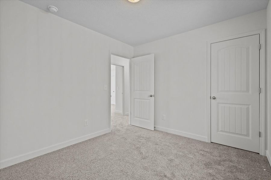 Representative unfurnished interior of a home built from the Roebuck by Enchanted Homes in Las Palomas Country Club Estates, La Vernia (Image 34).