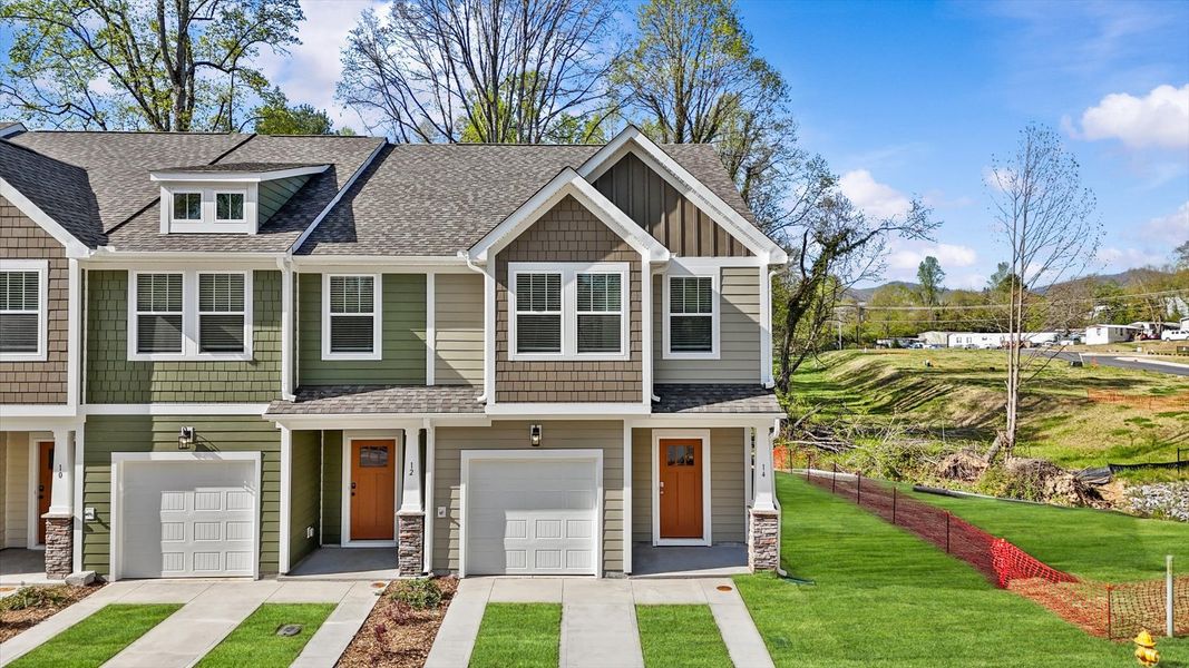 Front exterior of a new home in Clayton Crossing, Arden, NC, highlighting curb appeal (Image 1).