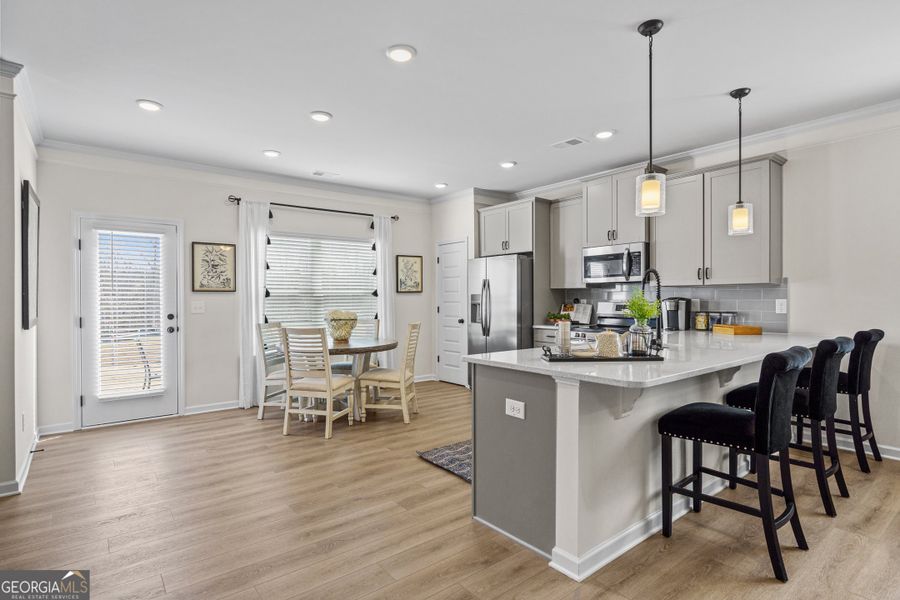 Furnished interior view inside a new home in Crescent Towns, Riverdale (Image 8).