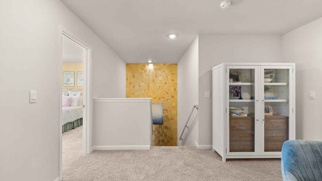 Representative furnished interior of a home built from the Iria Glen by D.R. Horton in Brookland Commons, Monroe (Image 32).