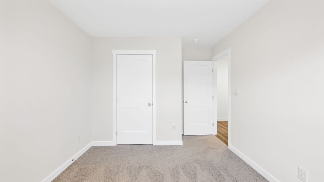 Representative unfurnished interior of a home built from the Freeport by D.R. Horton in Owensby Farms, Dayton (Image 17).