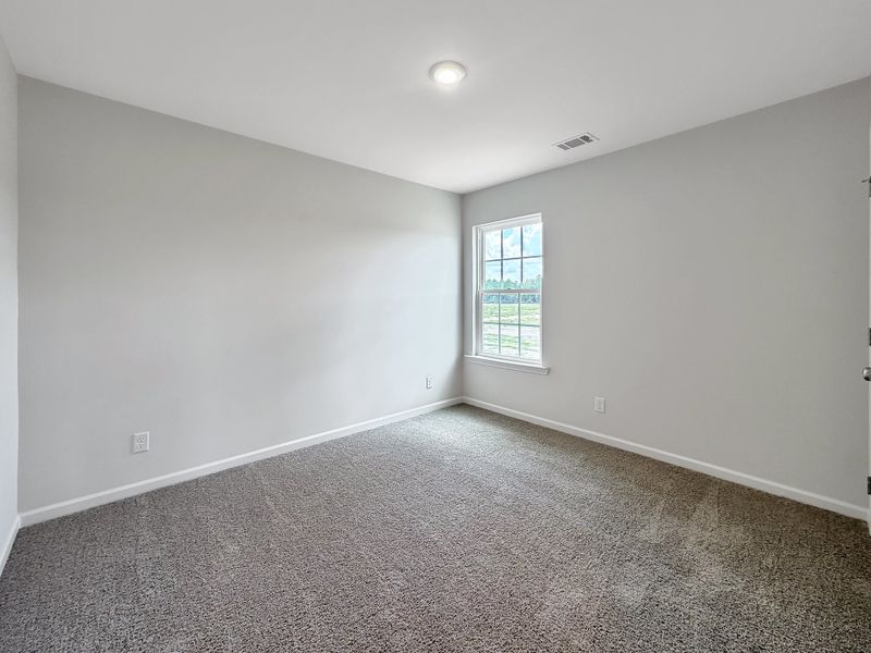 Spacious, unfurnished interior of a new home in Doctor's Creek, Ludowici (Image 17).