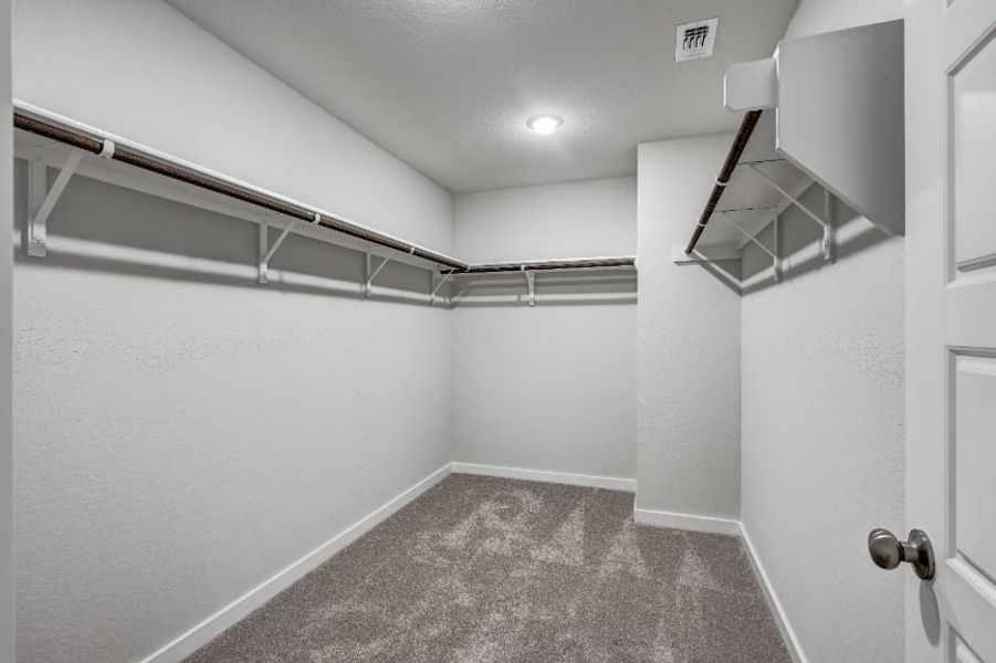 A hallway with white walls. A hallway with white walls.