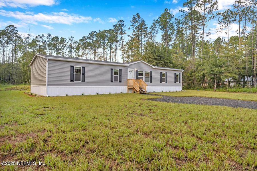Exterior details and patio area of a home in , Hastings (Image 2).