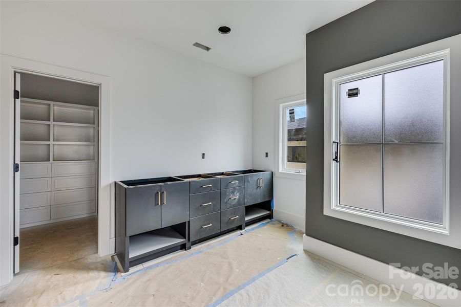 Primary bath, Round tub will be placed in front of the window, dual vanity