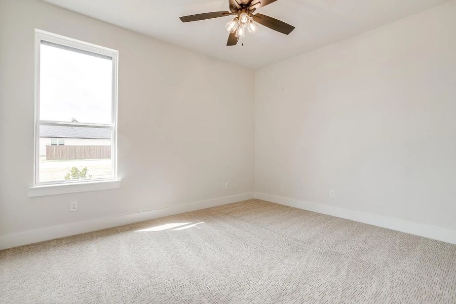 Representative unfurnished interior of a home built from the The Carley by Elmwood Custom Homes in Matthews Farm, Venus (Image 49).