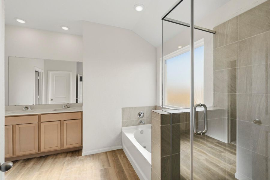 Furnished interior view inside a new home in Sunterra Lakes, Brookshire (Image 5).