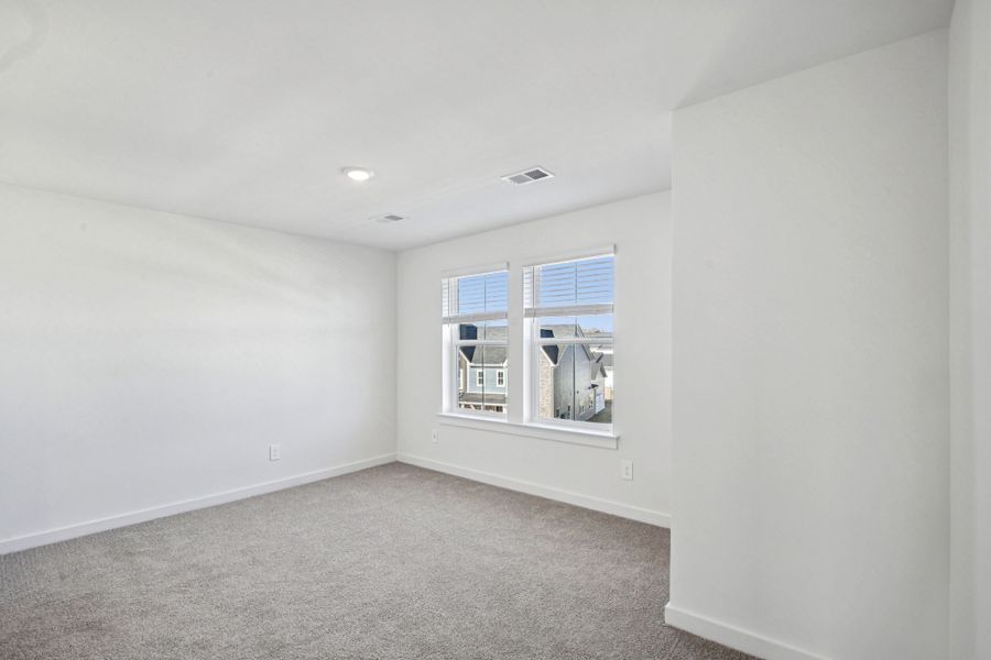 Spacious, unfurnished interior of a new home in Greystone - Highland Townhomes, Smyrna (Image 13).