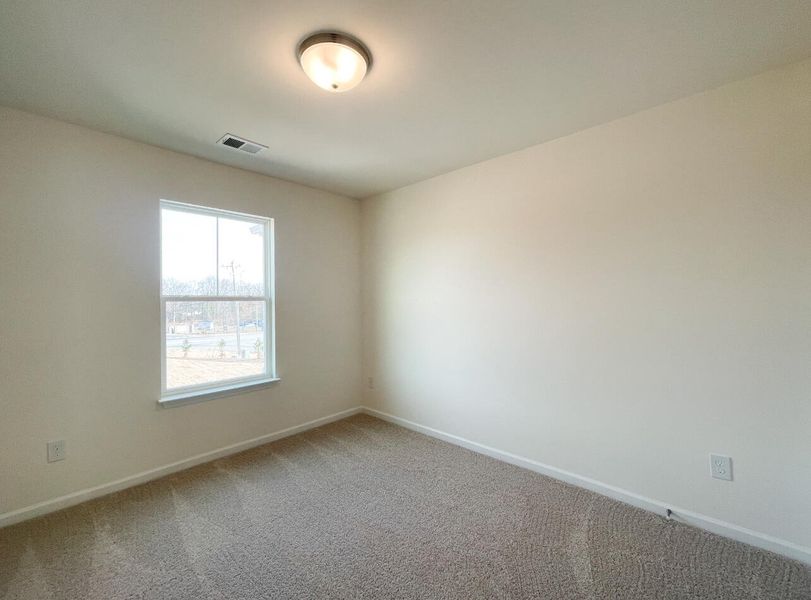 Spacious, unfurnished interior of a new home in Bellevue Townhomes, Greenville (Image 16).