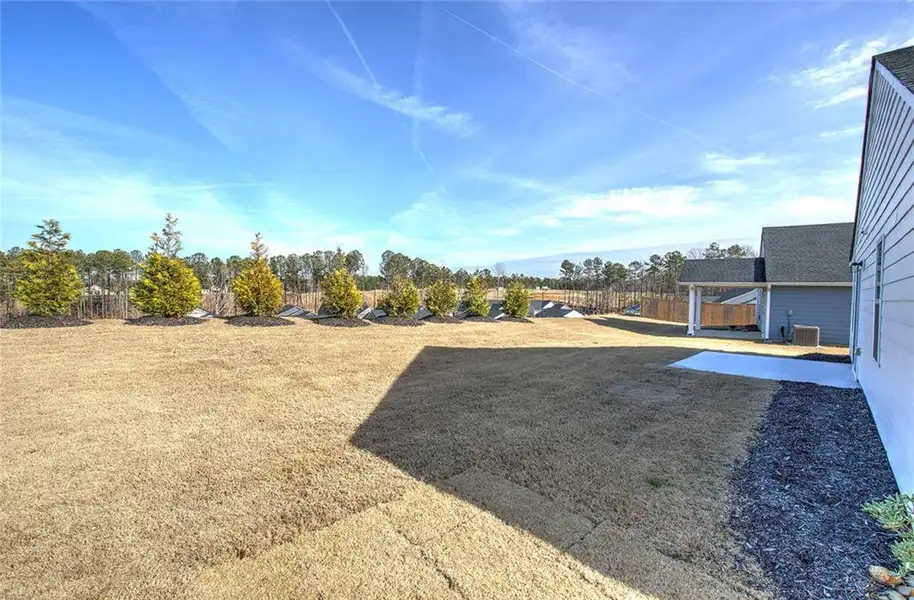 Exterior details and patio area of a home in Serenity 55+, Dallas (Image 20).