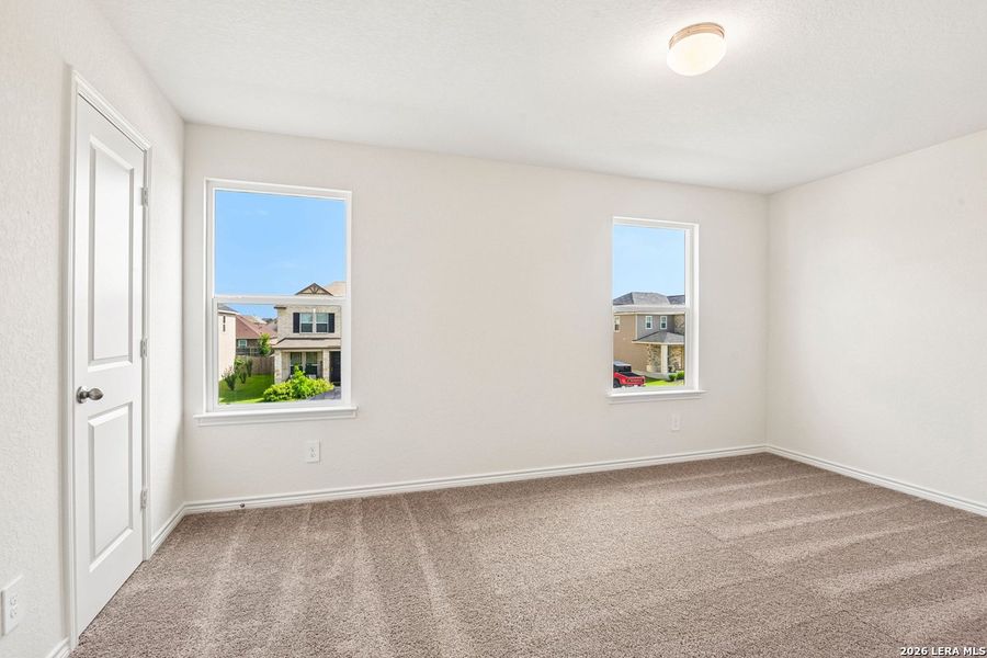 Spacious, unfurnished interior of a new home in Woodside Farms, Seguin (Image 21).