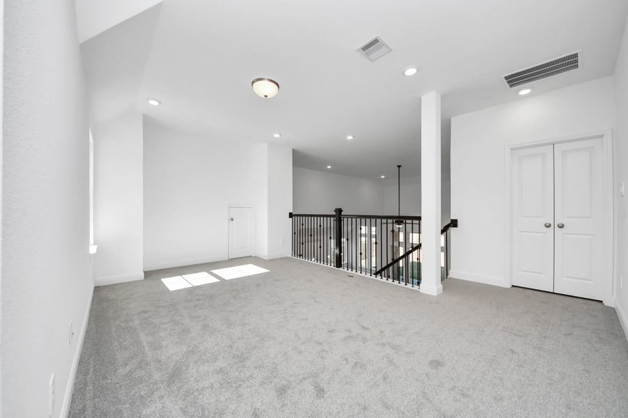 Spacious, unfurnished interior of a new home in ARTAVIA, Conroe (Image 22).