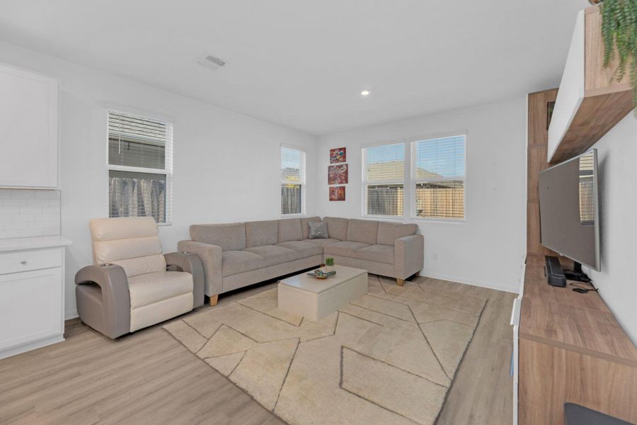 Furnished interior view inside a new home in Seasons at Carillon, Manor (Image 28).