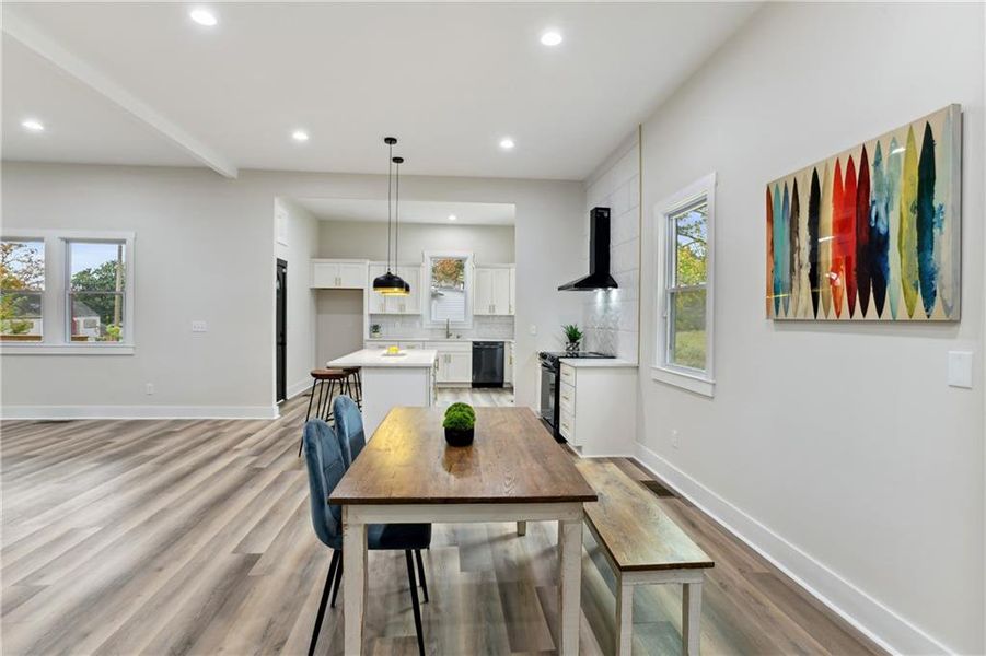 Dining room with light Luxury Vinyl Plank flooring