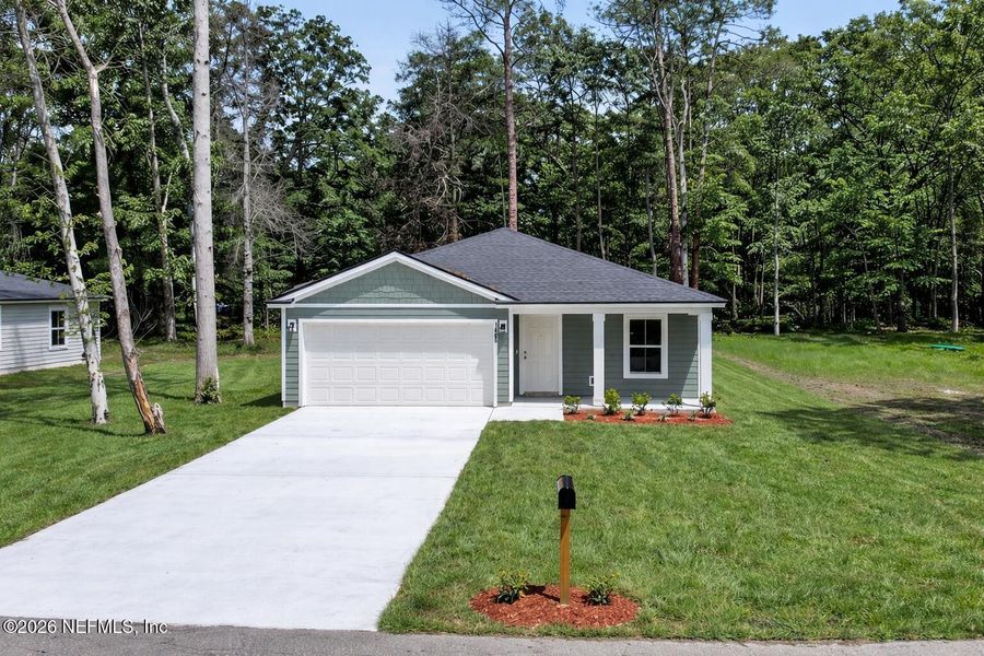 Front exterior of a new home in , Jacksonville, FL, highlighting curb appeal (Image 26).