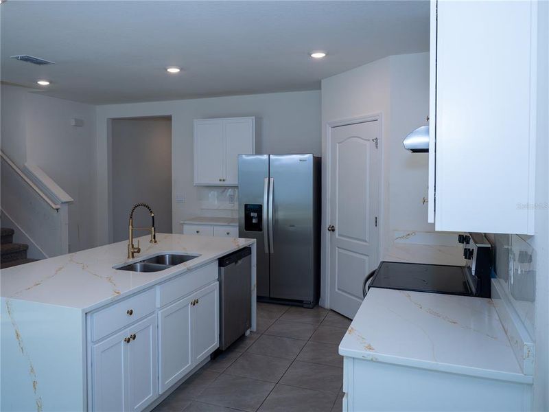 Furnished interior view inside a new home in Poinciana Enclave, Kissimmee (Image 5).