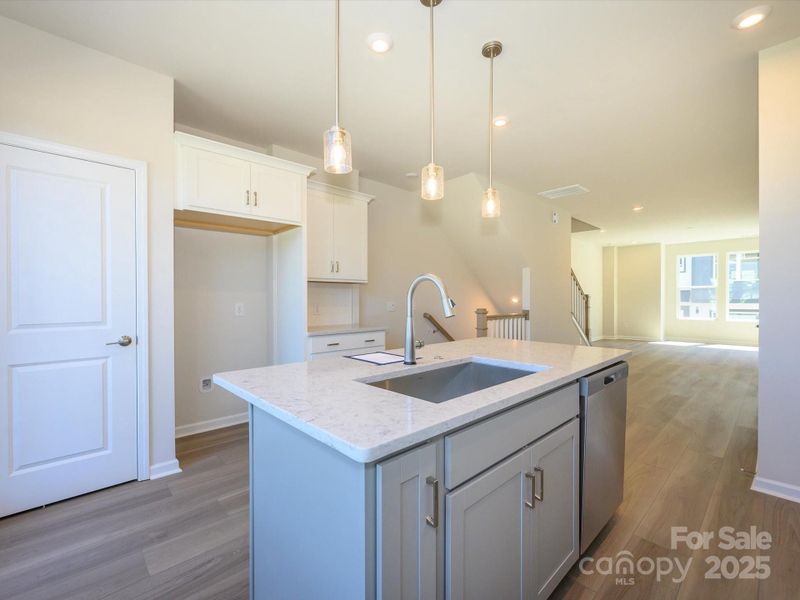 The ideal space for meal preparation and casual dining, this central island does it all.