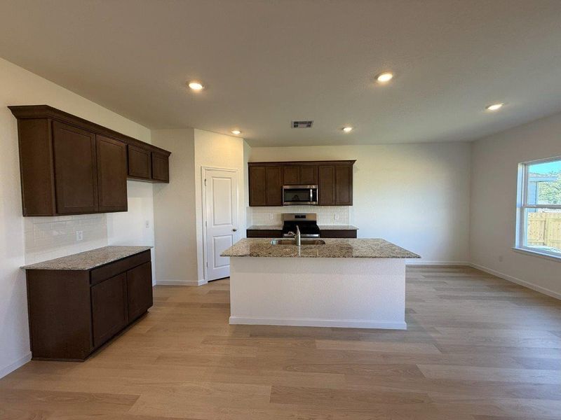 Furnished interior view inside a new home in Midtown Reserve, College Station (Image 4). Furnished interior view inside a new home in Midtown Reserve, College Station (Image 4).