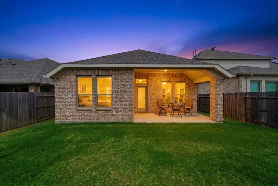 Exterior details and patio area of a home in Artavia, Conroe (Image 4).