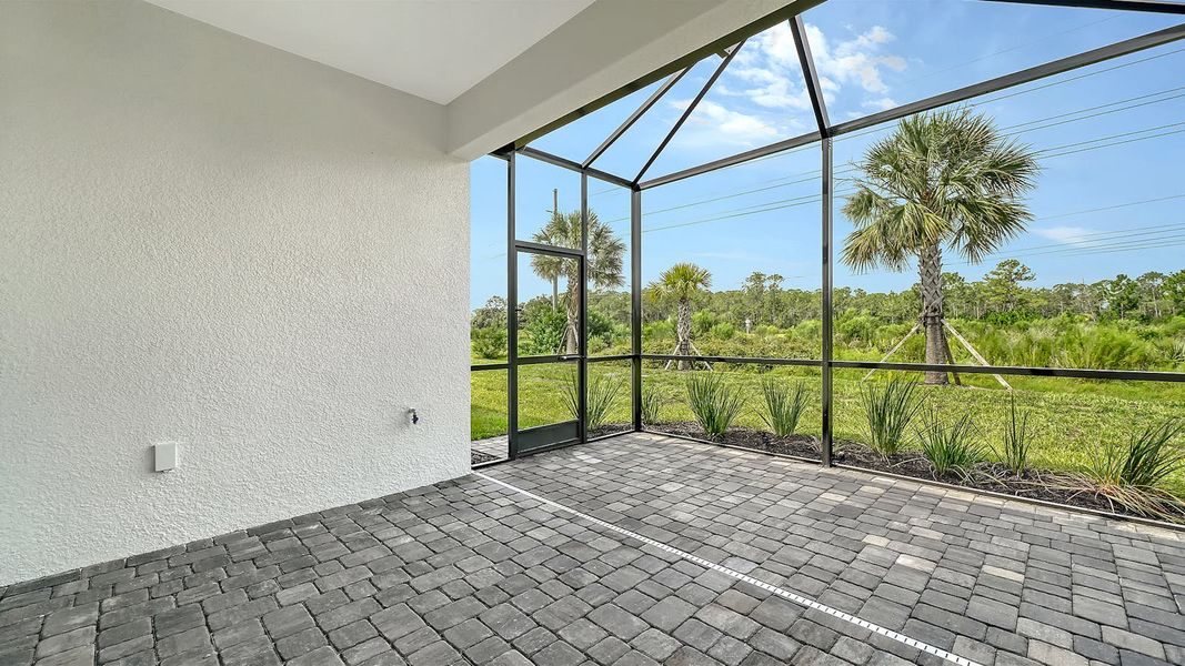 Exterior details and patio area of a home in Windward Real Estate and Homes for Sale in Sarasota, FL - Neal Communities, Lakewood Ranch (Image 19).