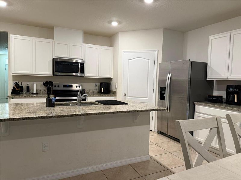 Furnished interior view inside a new home in Cypress Park Estates, Haines City (Image 8).