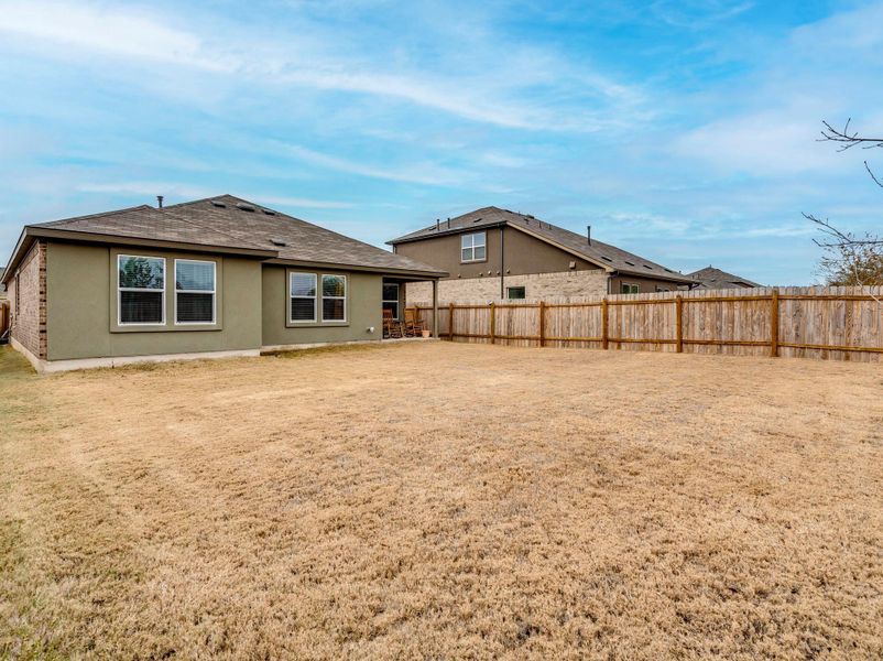 Tucked away on an oversized lot, this home offers ultimate privacy with a greenbelt backdrop and no neighbors on the right or behind