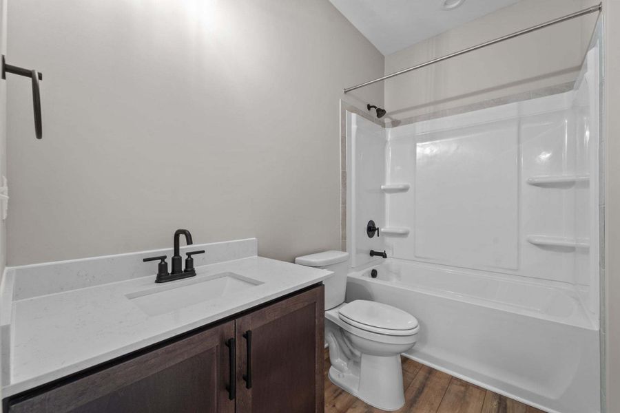 Representative furnished interior of a home built from the Weymouth by Caviness & Cates Communities in Bartlett Manor, Youngsville (Image 100).