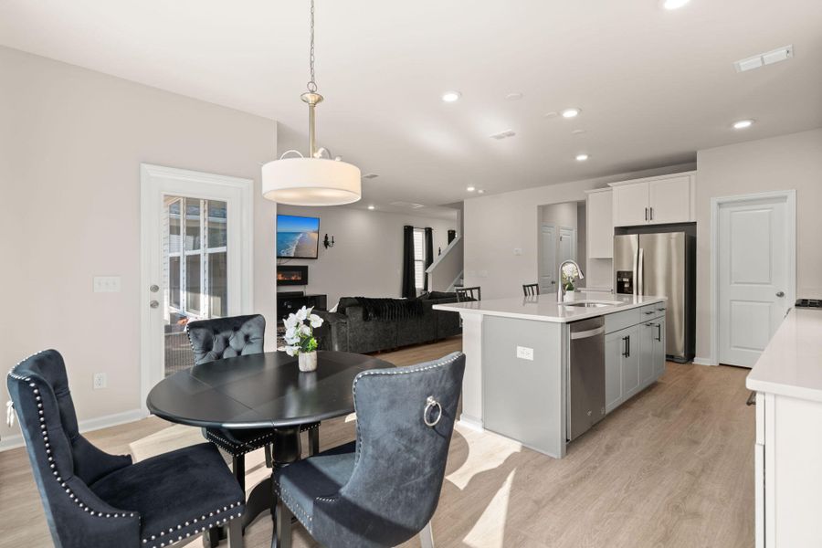 Furnished interior view inside a new home in Jasmine Point at Lakes of Cane Bay, Summerville (Image 14).
