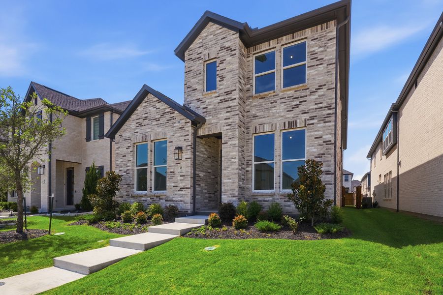 Front exterior of a new home in Light Farms Brenham - 40' Lots, Celina, TX, highlighting curb appeal (Image 24).