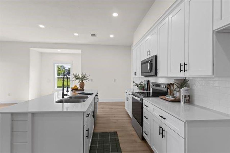 Furnished interior view inside a new home in , Orange (Image 11). Furnished interior view inside a new home in , Orange (Image 11).