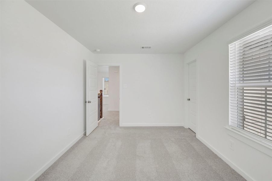 Spacious, unfurnished interior of a new home in Pinewood at Grand Texas, New Caney (Image 22). Spacious, unfurnished interior of a new home in Pinewood at Grand Texas, New Caney (Image 22).