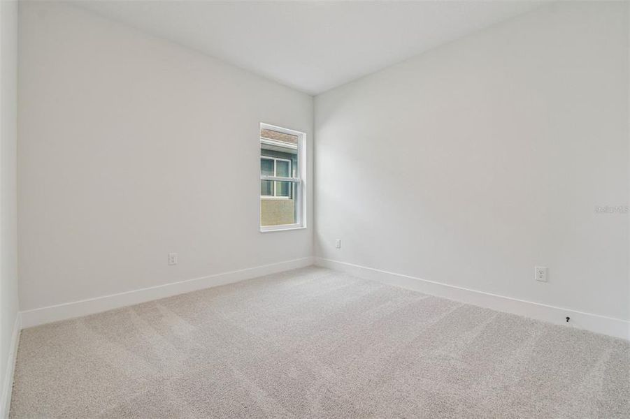 Spacious, unfurnished interior of a new home in The Peninsula at Rhodine Lake, Riverview (Image 20).