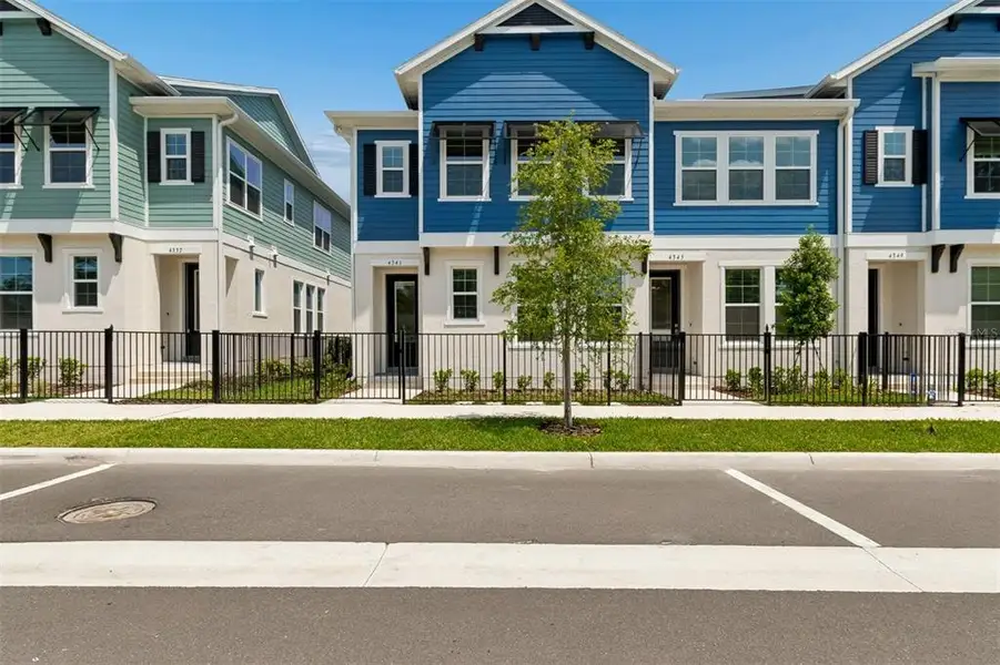 Front exterior of a new home in , Orlando, FL, highlighting curb appeal (Image 2). Front exterior of a new home in , Orlando, FL, highlighting curb appeal (Image 2).