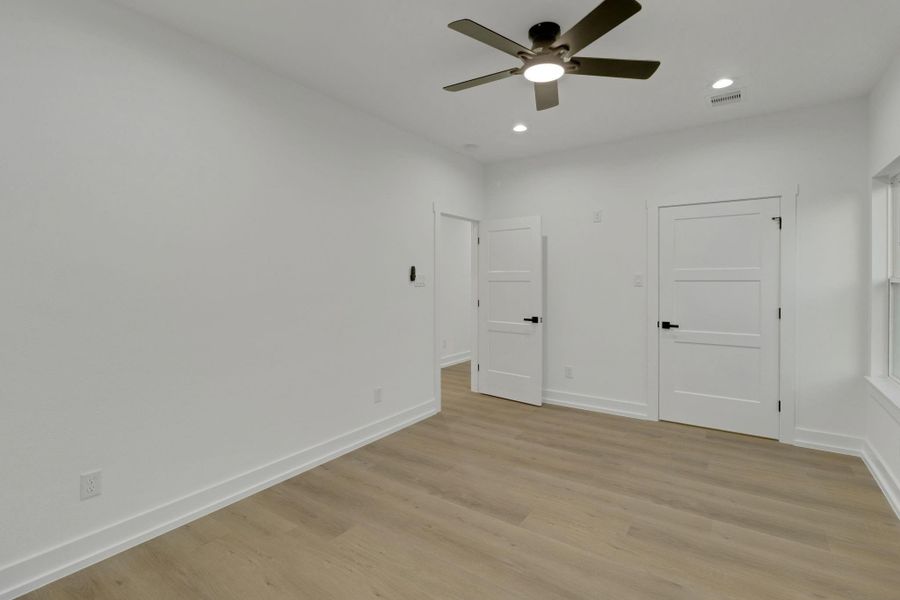Alternate view of this secondary bedroom with neutral finishes and plenty of space for versatile furniture layouts. Alternate view of this secondary bedroom with neutral finishes and plenty of space for versatile furniture layouts.